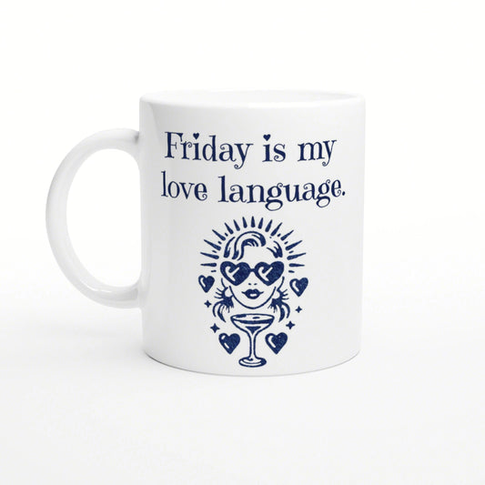 White mug with navy print Friday is my love language and a cartoon woman with heart sunglasses above a cocktail glass.