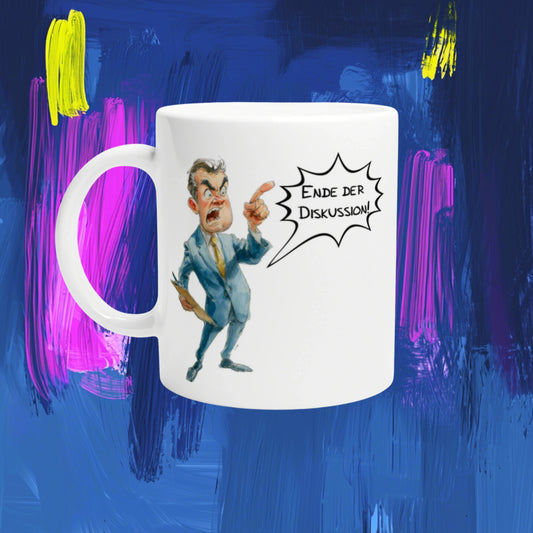 White mug mockup featuring a cartoon businessman in a blue suit angrily pointing, with a speech bubble reading 'Ende der Diskussion!'
