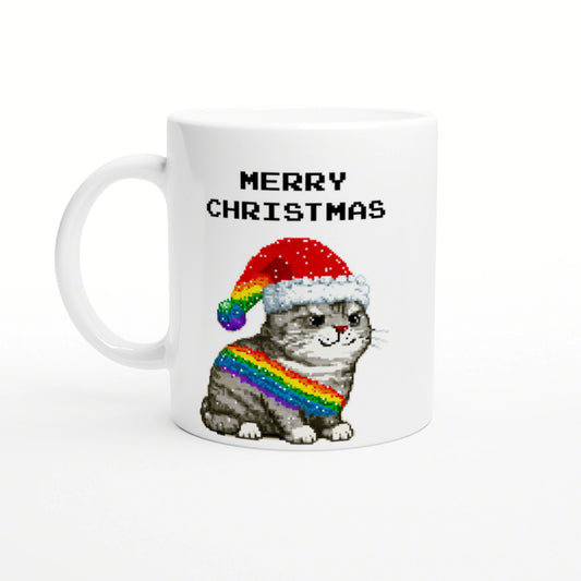 White mug with a pixel-art gray cat wearing a Santa hat and rainbow scarf, with MERRY CHRISTMAS text above.